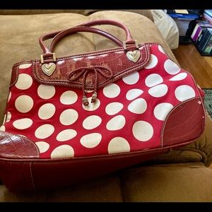 Women’s red and white polka dot purse